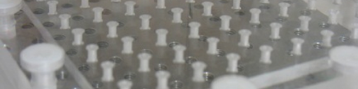 Dimensionally Stable Textile Preforms for use in Liquid Resin Infusion Manufacture